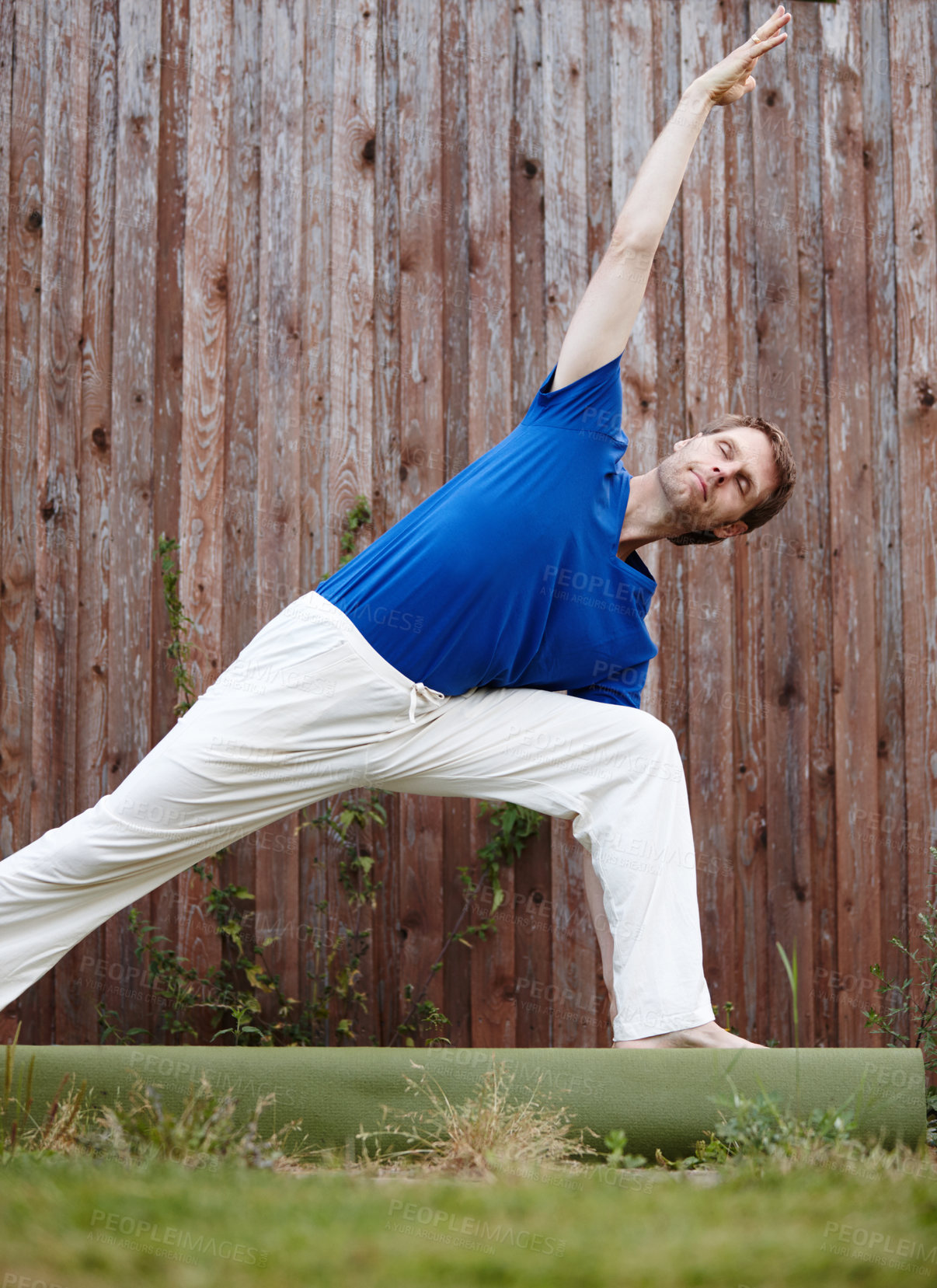 Buy stock photo Stretching, yoga and man with flexibility, calm and fitness for guy in morning, home and wellness. Outdoor, healthy and pilates for person with workout, house and peaceful on weekend for exercise