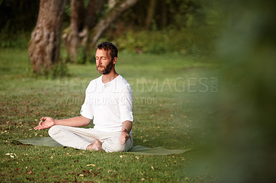 Buy stock photo Yoga, health and meditation with man in nature for lotus pose, peace and exercise balance. Wellness, workout and fitness with person on lawn of spiritual retreat for mindfulness, calm and zen