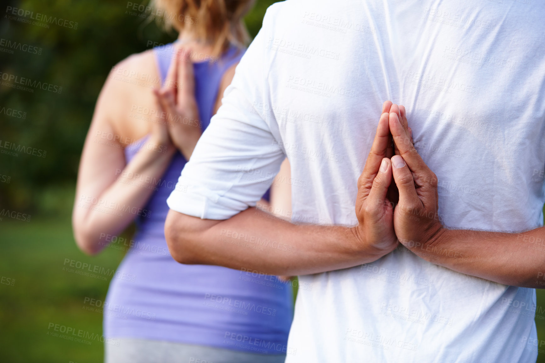 Buy stock photo Closeup shot of a man doing a yoga pose with his hands behind his back