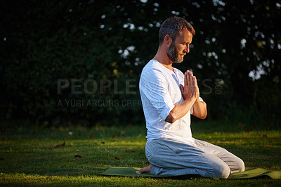 Buy stock photo Yoga, meditation and man outdoor with namaste for relax, balance or peace for holistic fitness. Calm, yogi or mature person with prayer hands pose on grass for zen, breathing exercise or healthy body