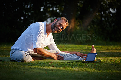 Buy stock photo Stretching, yoga and man with tablet, flexibility and fitness for guy in morning, online and wellness. Outdoor, portrait and person with smile for routine, pilates and tutorial for exercise on app