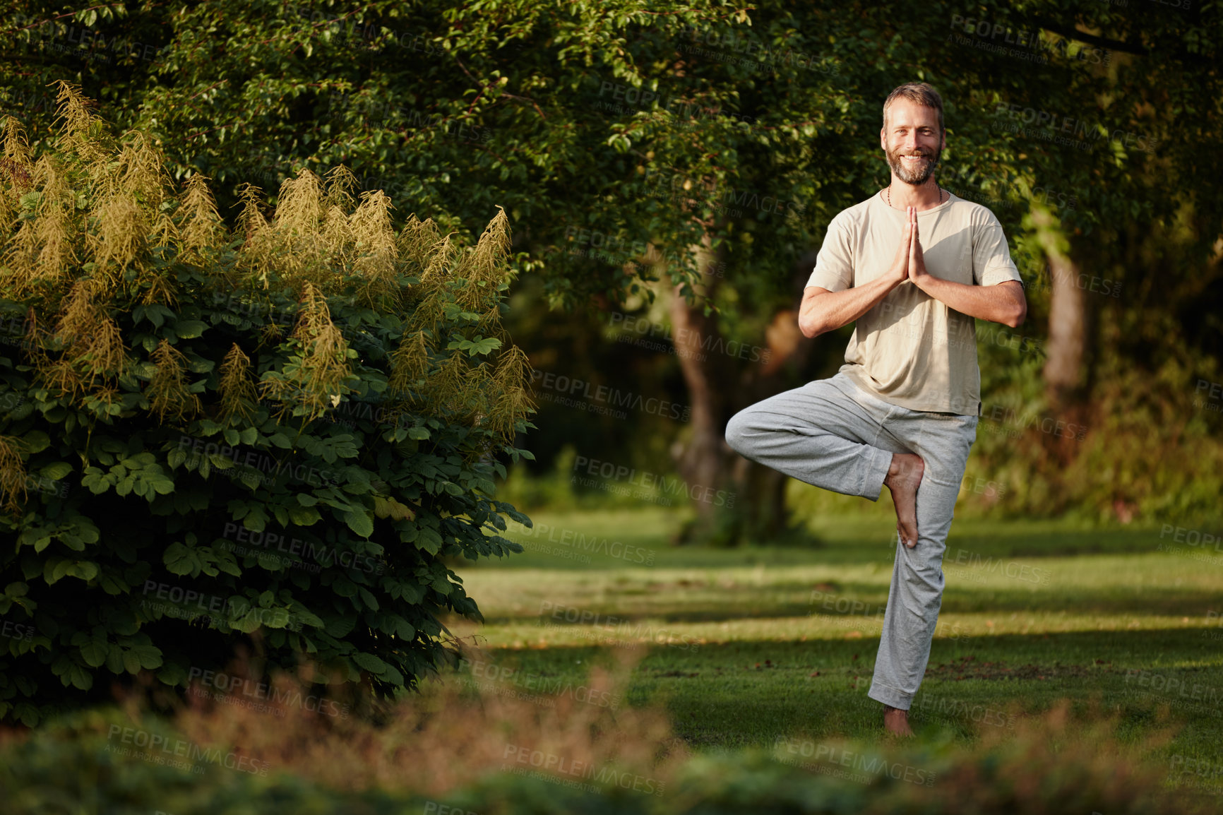 Buy stock photo Portrait of a handsome mature man enjoying a yoga session in nature