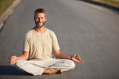 Buy stock photo Portrait, meditation and smile and man in road for wellness, lotus pose and yoga fitness. Exercise, health and zen with person outdoors for spiritual journey, mindfulness or self care balance