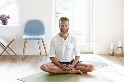 Buy stock photo Fitness, portrait and man with yoga on floor in home with balance, mindful and body exercise in morning. Pilates, relax and male person in lotus pose on mat for workout in living room at apartment.