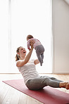 Yoga and baby-lifting: the perfect workout