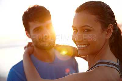 Buy stock photo Portrait shot of a beautiful woman with her boyfriend at sunrise