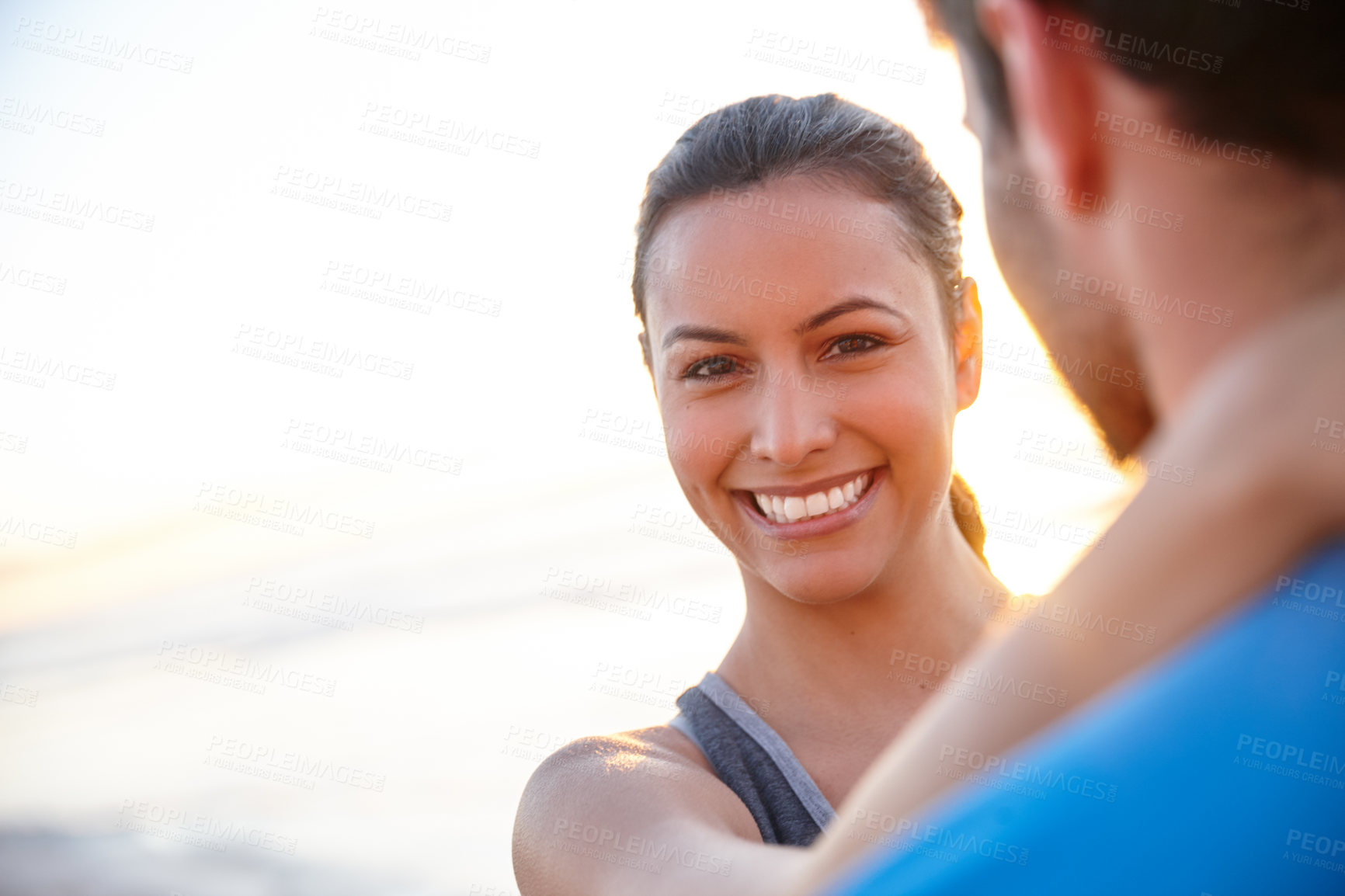 Buy stock photo Portrait shot of a beautiful woman with her boyfriend at sunrise