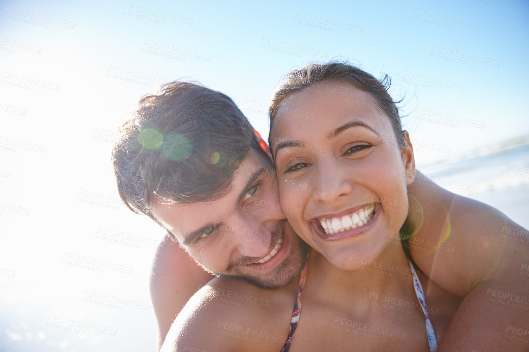 Buy stock photo Self portrait of a happy young couple at the sea together