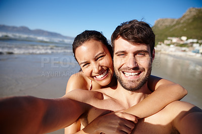 Buy stock photo Self portrait of a happy young couple at the beach together