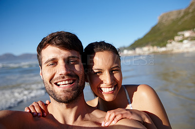 Buy stock photo Self portrait of a happy young couple at the beach together