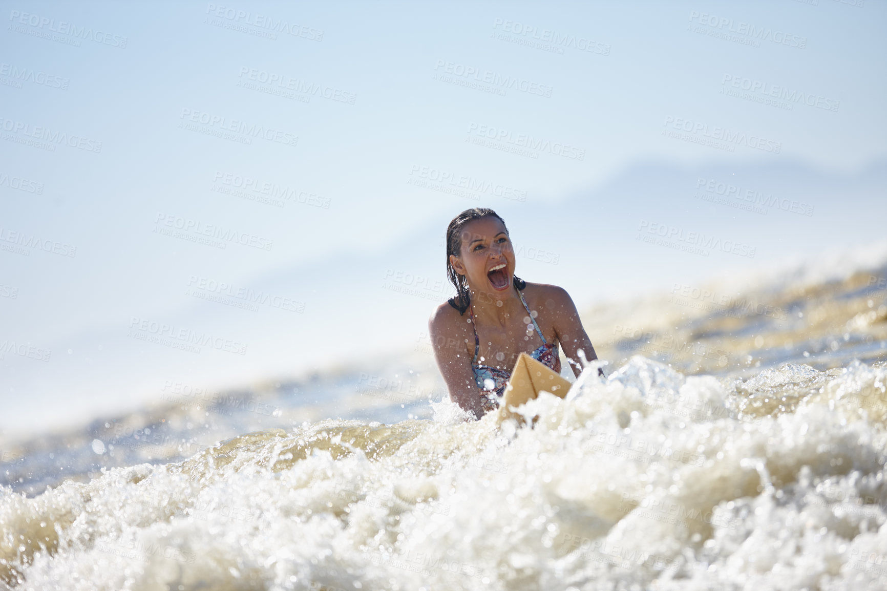 Buy stock photo Happy woman, beach and surfing with waves for swim, holiday or extreme sport in nature. Excited, female person or surfer with smile or surfboard in water on ocean coast or sea for fitness or tide