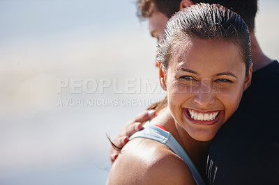 Buy stock photo Shot of a happy woman resting her head on her boyfriend's shoulder