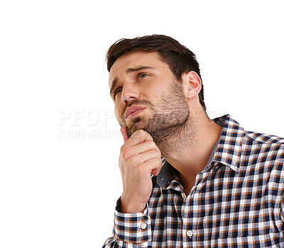 Buy stock photo Studio shot of a handsome young man racking his brain for ideas isolated on white