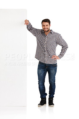 Buy stock photo Studio portrait of a handsome young man leaning against copyspace