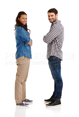 Buy stock photo Studio portrait of a young couple standing with their arms folded isolated on white