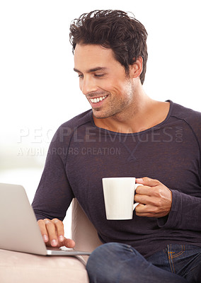 Buy stock photo Coffee, laptop and laugh with man on sofa for social media, networking and connection. Website, streaming and digital with person in living room at home for remote work, research and technology