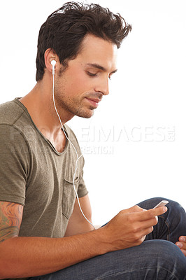 Buy stock photo Man, player or earphones with relax for music, podcast or radio streaming for break in studio or mock up. Person, face or listen with technology for sound, song or audio for peace on white background