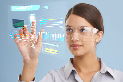 Buy stock photo Shot of a female scientist using a digital interface to do a DNA analysis