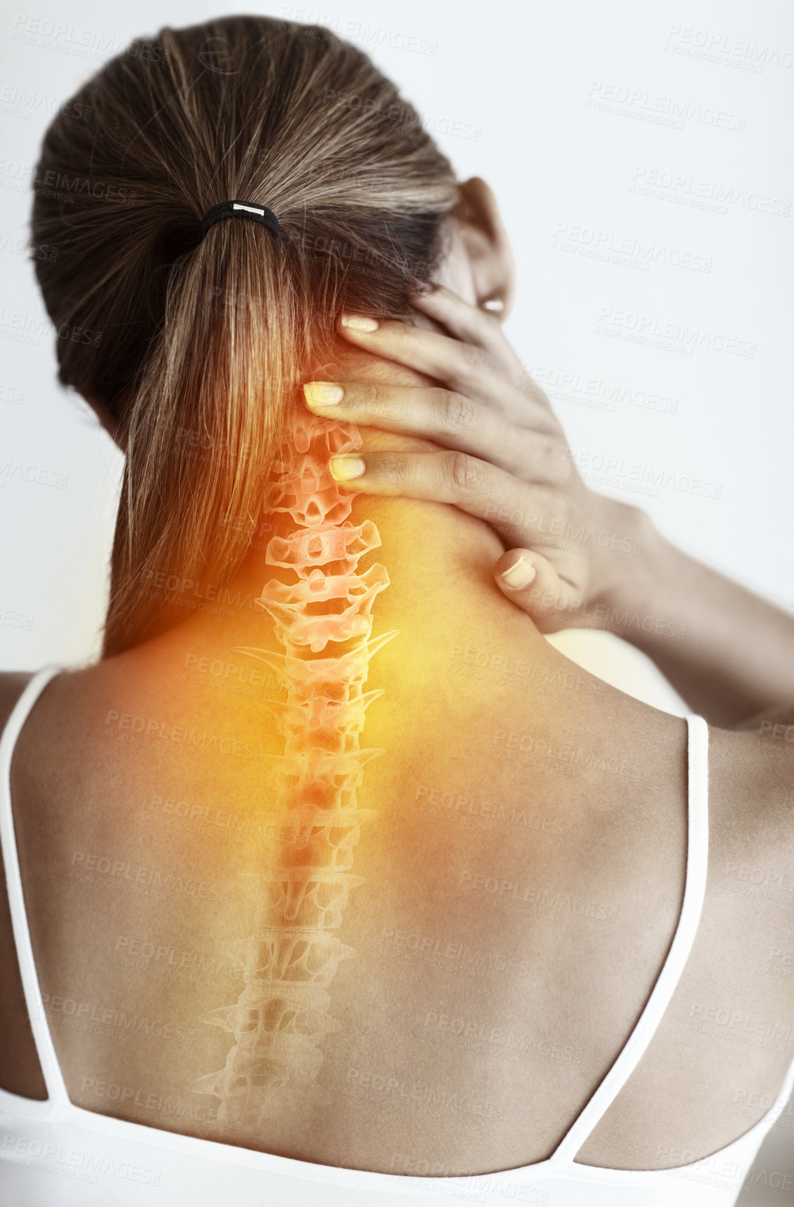 Buy stock photo Rear view of young woman suffering from severe neck ache