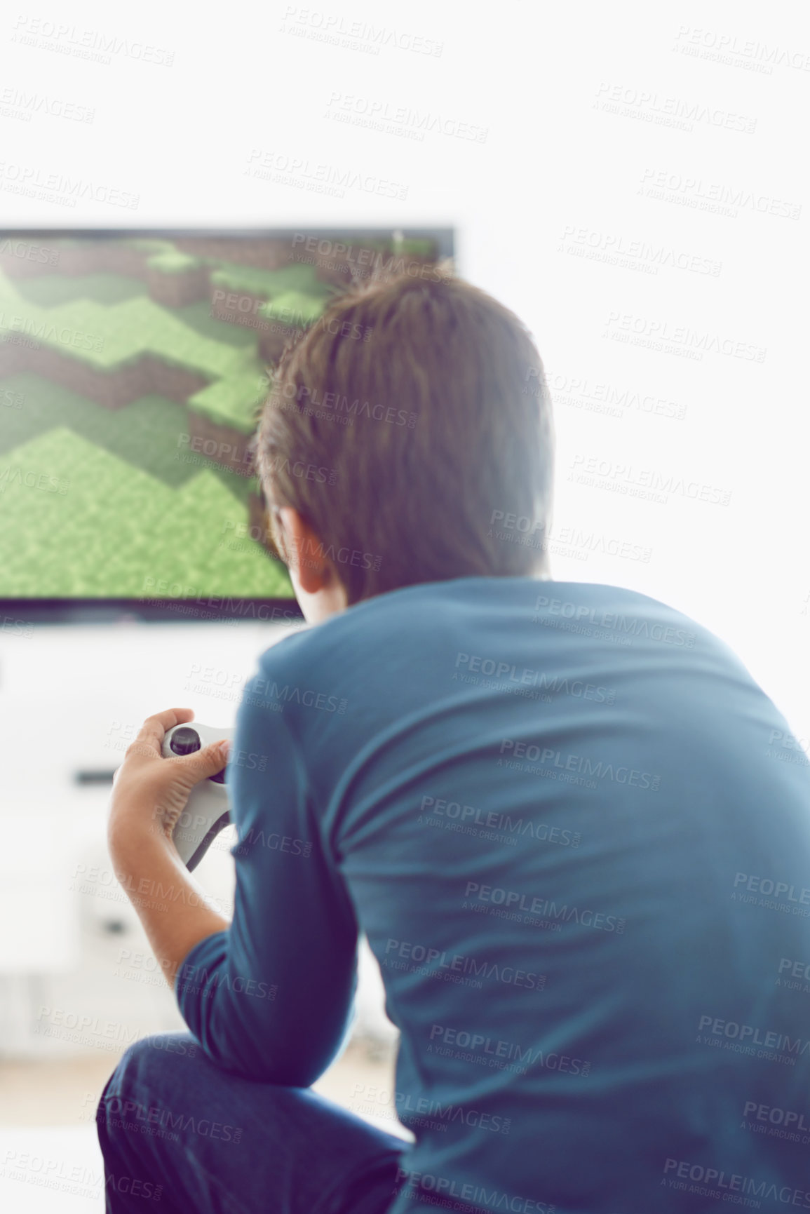 Buy stock photo Video, game and boy in home playing with internet connection, weekend and challenge from back. Technology, software and online gamer child in living room with computer screen for creative digital app