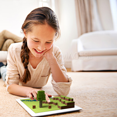 Buy stock photo Child, happy and tablet for online games, gamification or virtual entertainment with digital animation. Ground, girl or kid with technology with graphics for gaming, building and designing in home