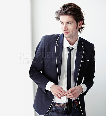 Buy stock photo Happy, fashion and young man by a wall with formal, stylish and classy outfit for confidence. Smile, suit and male model from Canada with elegant, cool and trendy style by white background space.