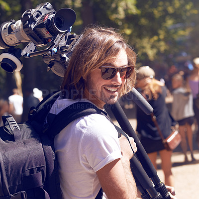 Buy stock photo Cropped shot of a young cameraman at a festival