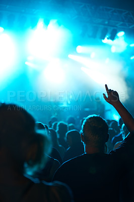 Buy stock photo Shot of a fans watching a live concert