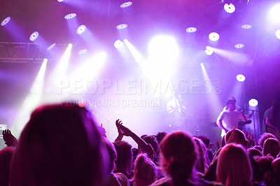 Buy stock photo Shot of a fans watching a live concert