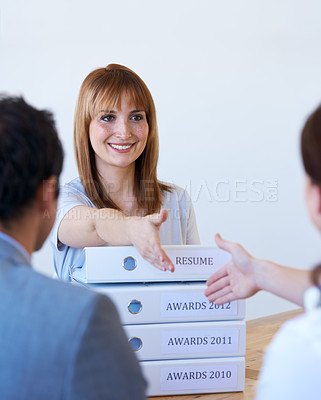 Buy stock photo Business, people, woman and handshake with recruitment, documents and achievement in a workplace. Staff, employers and consultant with human resources, shaking hands and resume with job interview