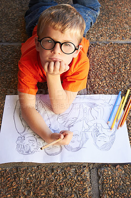 Buy stock photo Portrait, creative and student with a sketch, drawing and creativity with a talent, learning and paper on the ground. Face, kid and child with knowledge, development or artistic with colour or pencil