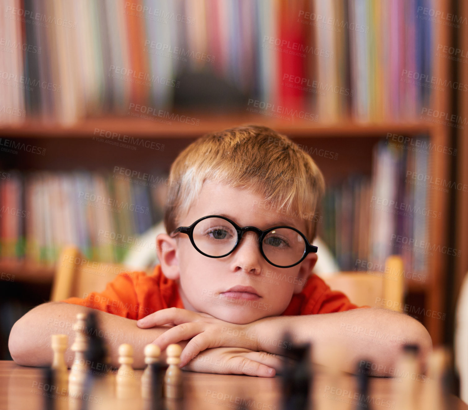 Buy stock photo Portrait, chess and boy with glasses, bored and competition with training, skills and clear vision. Face, person or kid with eyewear, tournament or game with thinking, contemplation, ADHD or solution