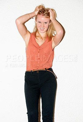Buy stock photo Fashion, frustrated and portrait of woman with attitude, anger and style on a white background. Attractive, pulling hair and isolated person in trendy clothes, casual outfit and stylish in studio