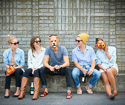 Buy stock photo Shot of friends having fun together with masks