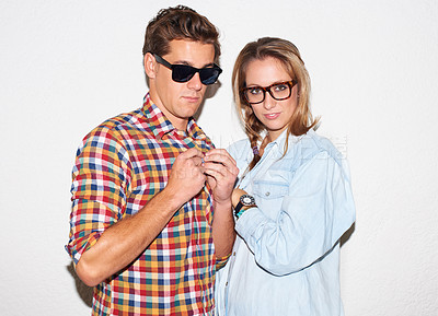 Buy stock photo Portrait of cool people, hipster couple with glasses and gen z fashion, university culture of youth. Fun, young woman and man in casual clothes at college date, students on white wall background.