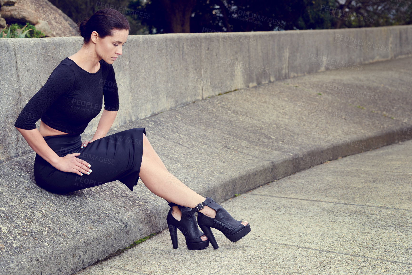 Buy stock photo Fashion, woman and thinking with black clothing for thoughtful, mindfulness and sitting on concrete. Reflecting, pavement and female model on urban walkway for memories, ideas and meditation in city