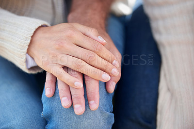Buy stock photo Closeup, holding hands and couple with love, support and trust in partnership or marriage together. Care, man and woman bonding with solidarity, empathy and sign of kindness, compassion or connection