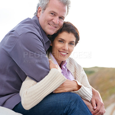 Buy stock photo Couple, face and happy outdoor with hug for romance, love and relationship in nature with relaxing. Mature, man and woman or embrace with smile, comfort and trust for bonding, honeymoon and support 