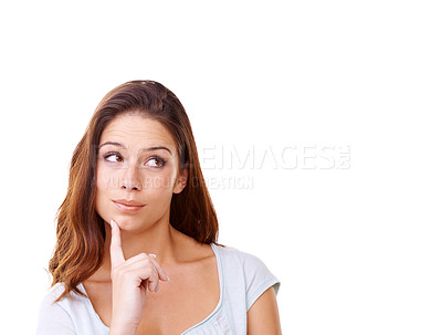 Buy stock photo A young woman thinking against a white background