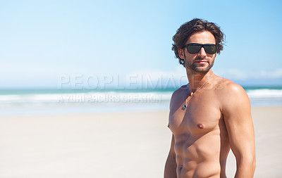 Buy stock photo Summer, space and the body of a man on the beach for travel, relax or adventure on vacation. Sand, sunglasses and a young person shirtless by the ocean or sea on a tropical coast for holiday