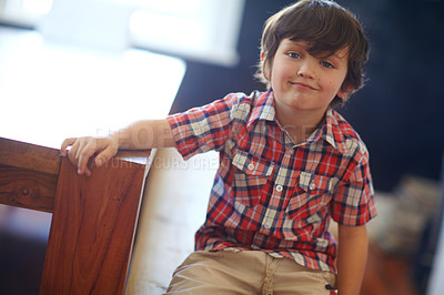 Buy stock photo Shot of a cute little boy looking at the camera