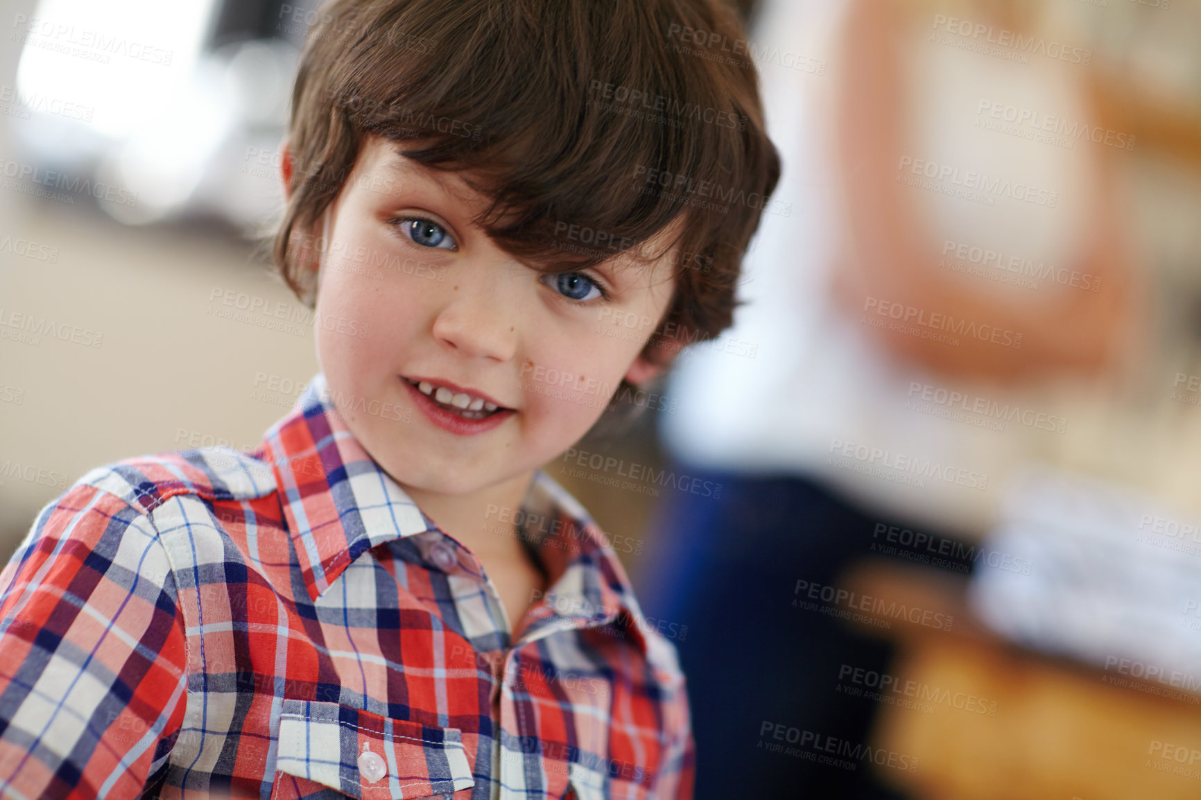 Buy stock photo Shot of a cute little boy looking at the camera