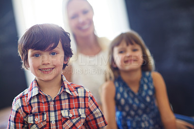 Buy stock photo Shot of a happy family spending quality time together at home