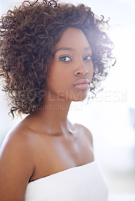 Buy stock photo Beauty, confidence and portrait of black woman in bathroom with skincare, facial or getting ready. Morning, routine and face of girl with towel, natural cosmetics and skin glow dermatology at home