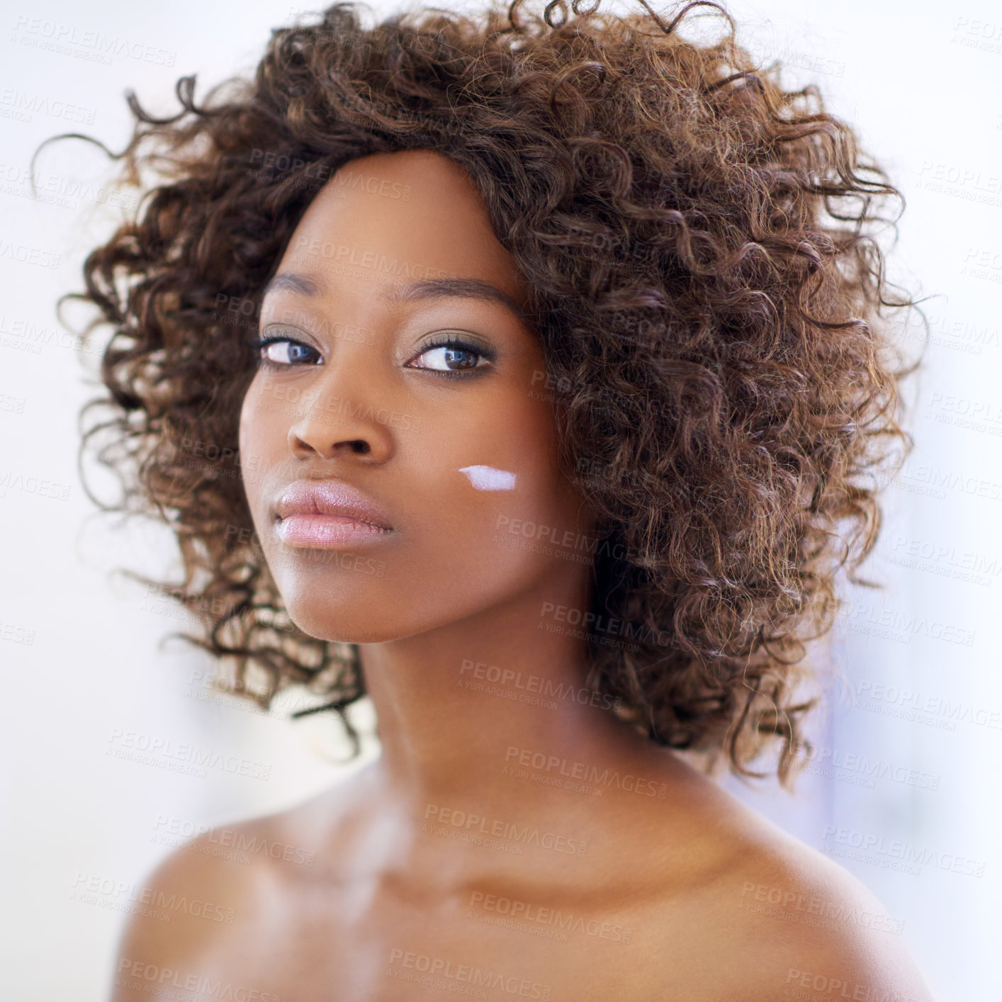 Buy stock photo Beauty, cream and portrait of black woman in bathroom for skincare, facial or collagen treatment. Morning routine, confidence and girl with lotion on face, natural cosmetics or dermatology in home