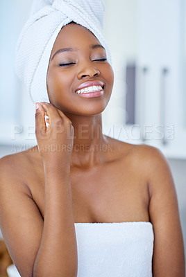 Buy stock photo Skincare, happy and black woman in bathroom for beauty, shower or hygiene routine in morning. Towel, fresh and African female person with clean facial dermatology treatment for health at home.