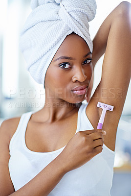 Buy stock photo Portrait, beauty and black woman shaving underarm in bathroom, getting ready and smooth skin with razor. Morning routine, hygiene and girl with armpit hair removal product, towel or cosmetics in home