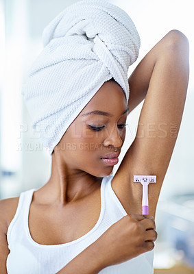 Buy stock photo Skincare, razor and black woman shaving armpit in bathroom with beauty, getting ready and smooth skin. Morning routine, hygiene and girl with underarm hair removal product, towel or cosmetics in home