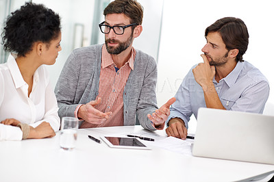 Buy stock photo Shot of a group of a diverse group of business professionals having a meeting