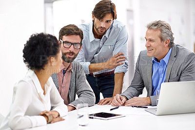 Buy stock photo Shot of a group of a diverse group of business professionals having a meeting